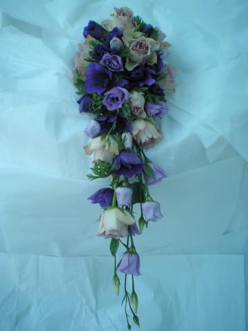 Brompton Floral Designs Wedding Flowers Central London UK NW4  - A shower bouquet using Purple Anemones, Lisianthus and Cool Water Lilac Rose. 